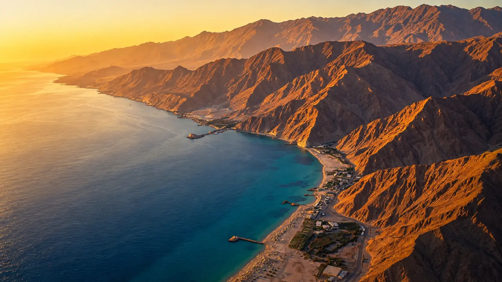 Illustrative mountain coastline at sunset